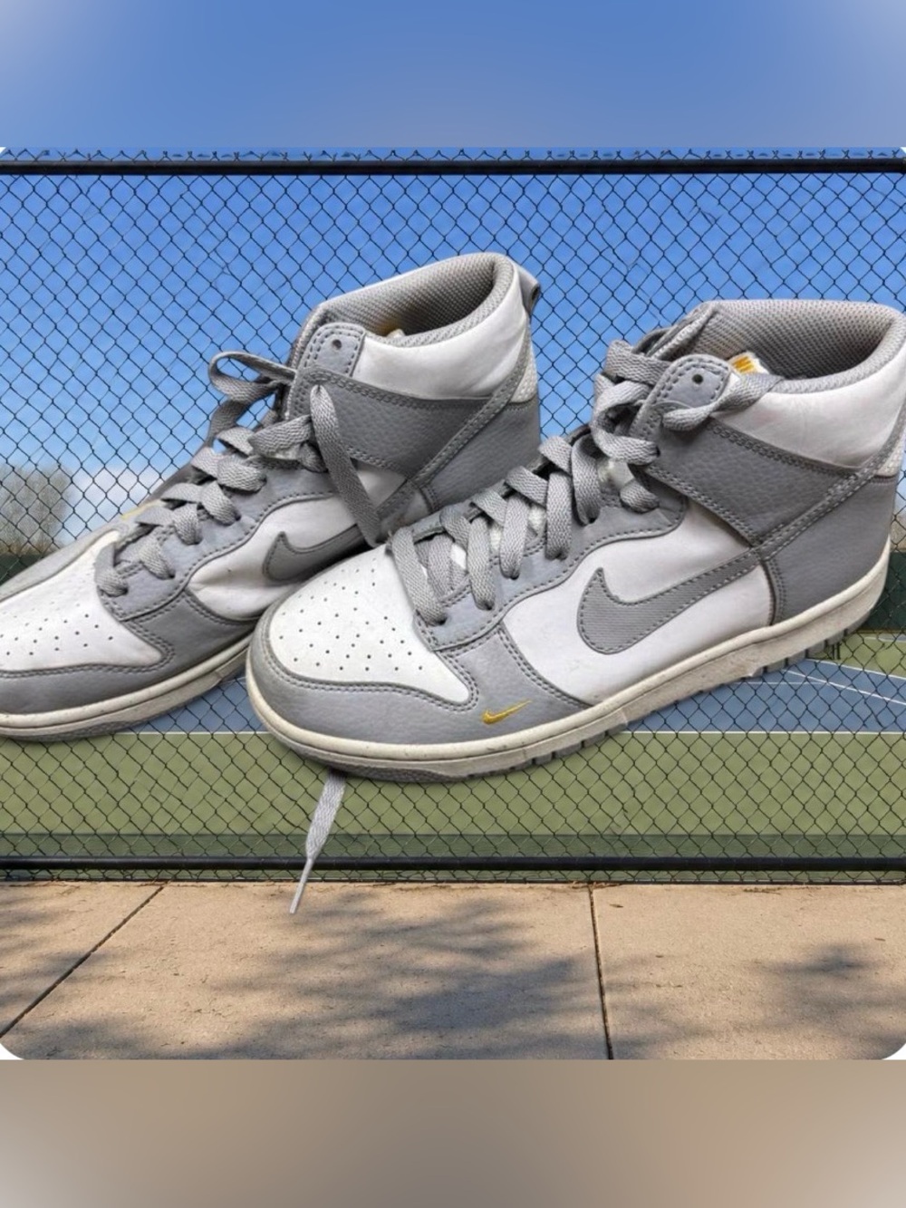 Nike Kids White and Gray High-Top Sneakers with Small Yellow Accent